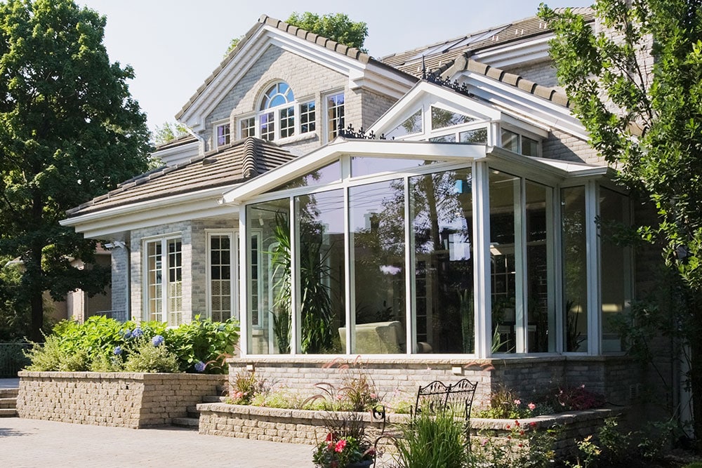 New sunroom with floor to ceiling windows